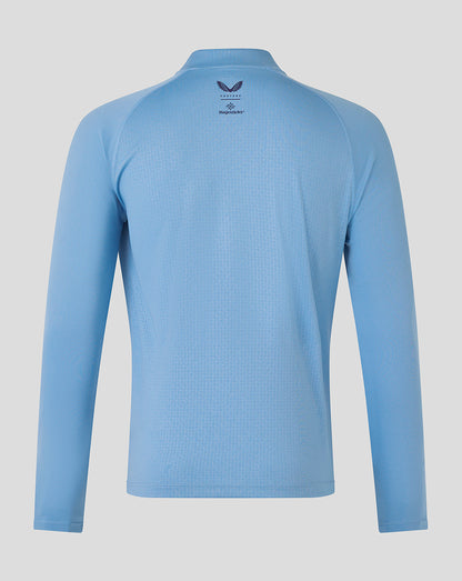 Back view of Majesticks GC Training 1/4 Zip Top in light blue with branding at the upper back