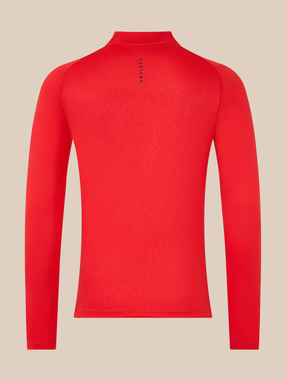 Back view of red Adapt Training top with vertical Castore branding along the spine