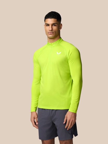Lime green Adapt Training quarter zip top viewed from a back angled side showing the all over print