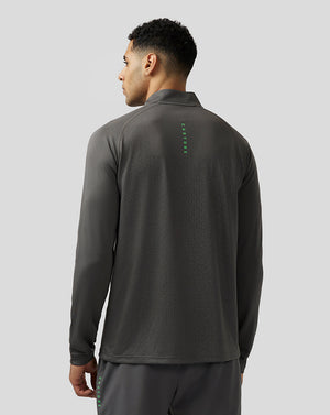 Back view of Men's Adapt Print 1/4 Zip Top in gunmetal gray with a geometric pattern and vertical green Castore branding down the center back