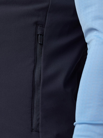 Close-up of side zip pocket on navy Apex Training Gilet with black zipper