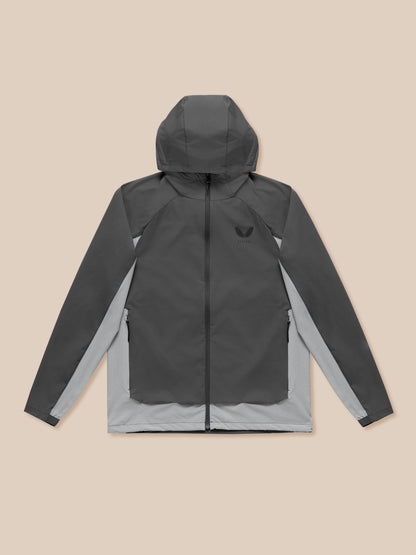 Male model in grey Flex Hooded Jacket with front zip and contrasting side panels; hood up