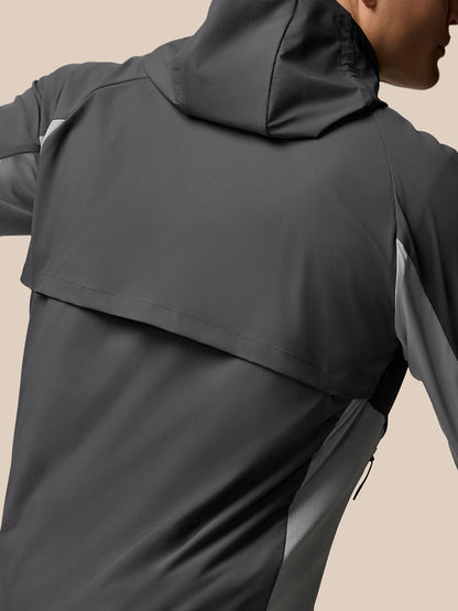 Back view of grey Flex Hooded Jacket showing hood and shoulder paneling.