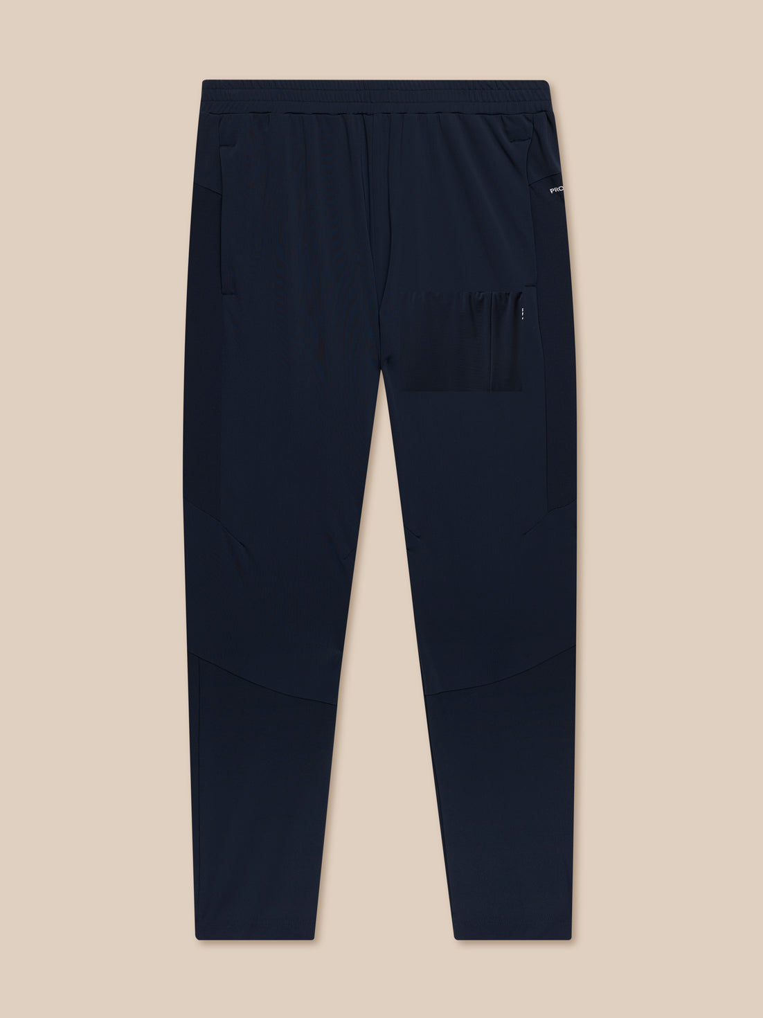 Back view of navy Flow Training Joggers laid flat showing elastic waistband and rear pocket