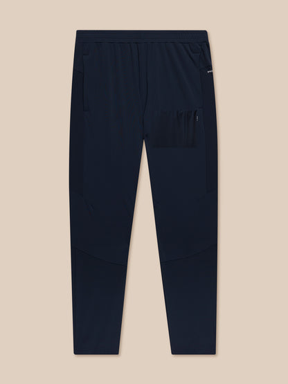 Back view of navy Flow Training Joggers laid flat showing elastic waistband and rear pocket
