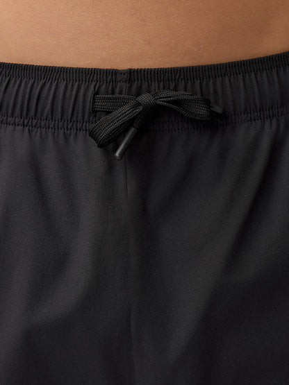 Close-up of the black joggers waistband with a tied drawcord