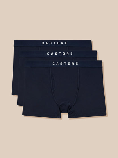Three navy Castore Active boxer shorts in a 3 pack with branded elastic waistbands