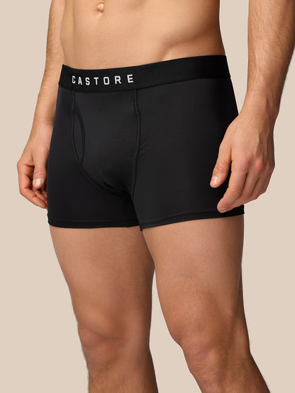 Back view of a man wearing black Castore boxer briefs with a branded waistband