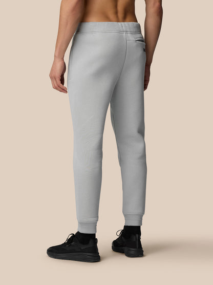 Back view of Adapt Fleece Joggers in grey showing tapered fit and ribbed cuffs.