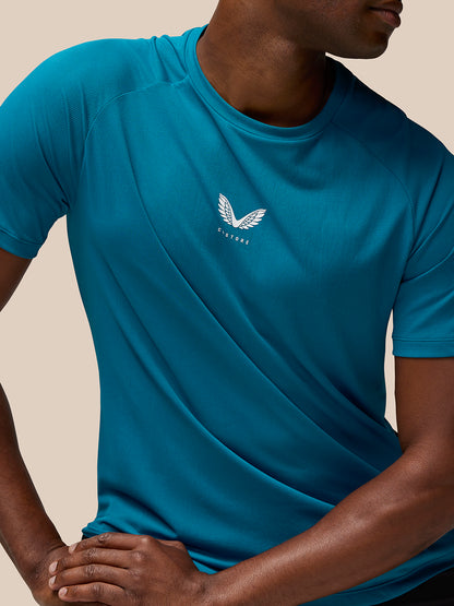 Front view of Flow Training T Shirt Dark Aqua with Castore logo on chest