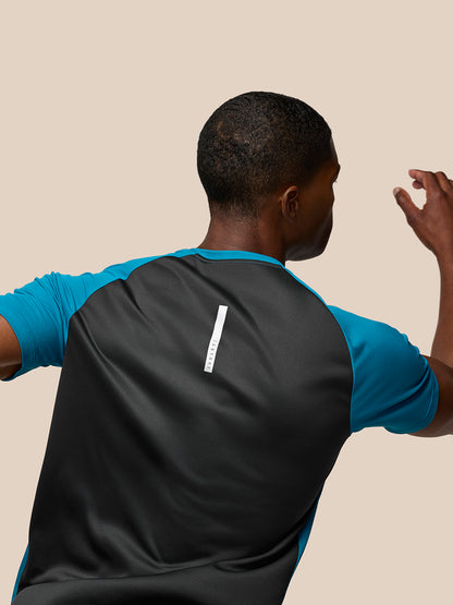 Back view of Flow Training T Shirt Dark Aqua with turquoise sleeves and a vertical white logo on the upper back