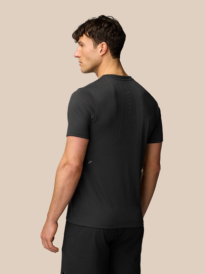 Back view of black Apex Training T-Shirt showing breathable mesh panels and subtle branding