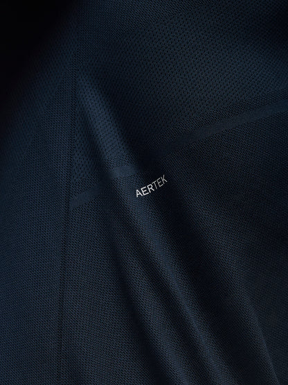 Close up of navy Apex Training T Shirt fabric with AERTEK branding on the back panel