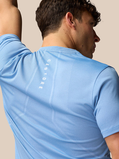 Back view of sky blue Apex Training T-Shirt with vertical Castore branding along the spine.