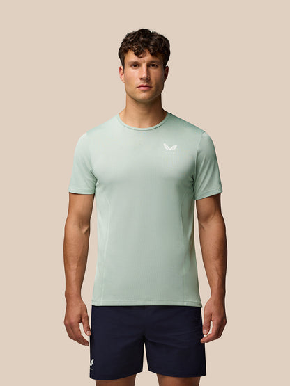 Man wearing green Apex Training T Shirt with crew neck and short sleeves