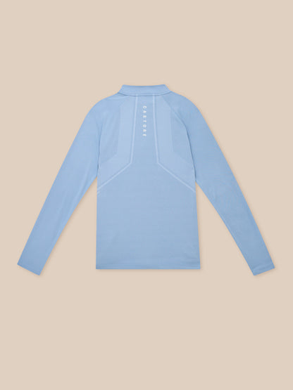 Back view of the light blue Apex Training top showing vertical Castore branding down the back