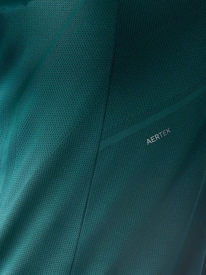 Close up of teal AerTek mesh fabric with visible AERTEK branding