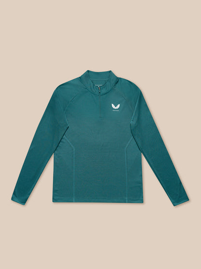 Aqua Apex Training long sleeve knit top laid flat with center front zip and Castore logo