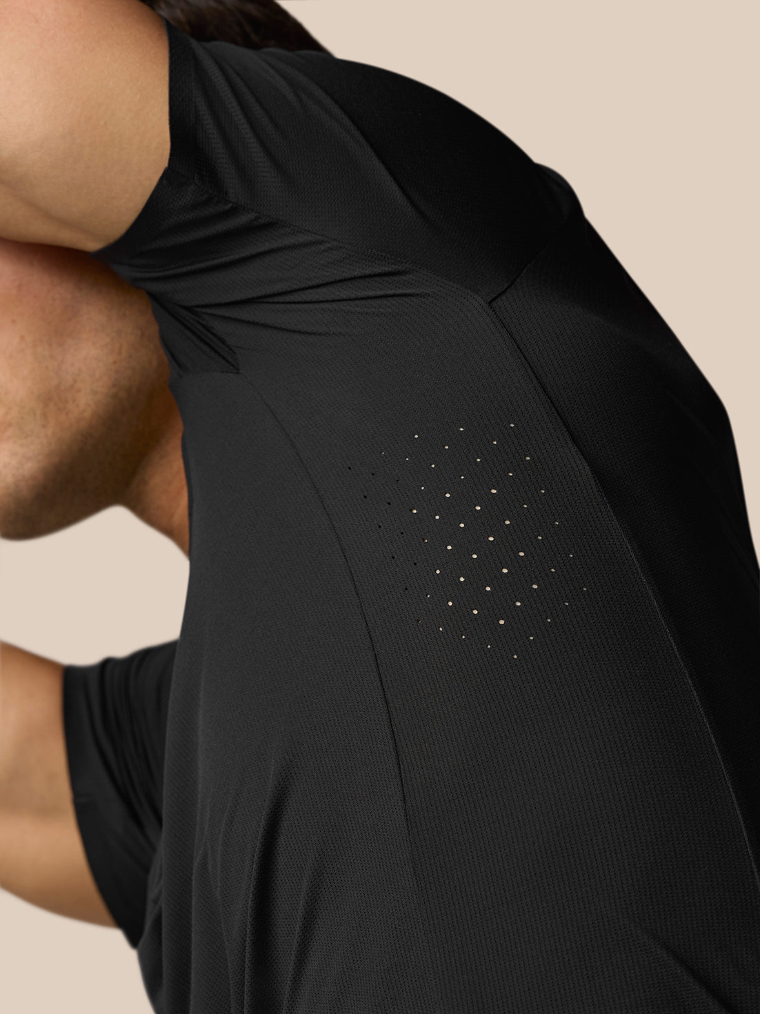 Shoulder and upper back close-up of Zone Training T-Shirt highlighting perforated ventilation panel.