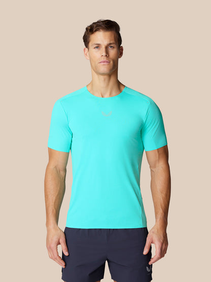 Male model wearing light aqua Zone Training T Shirt with crew neck and subtle chest branding