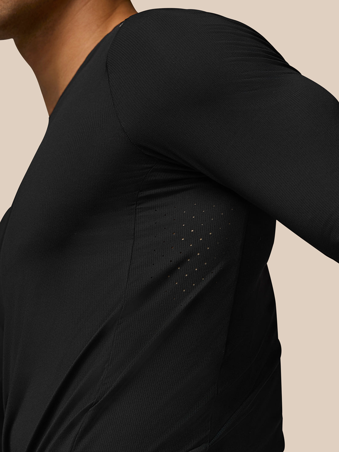 Close up of black Zone Training T-Shirt showing side ventilation perforations