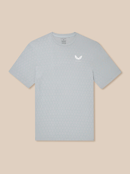 Grey Flow Training T Shirt featuring hex honeycomb pattern and a white Castore logo on the chest