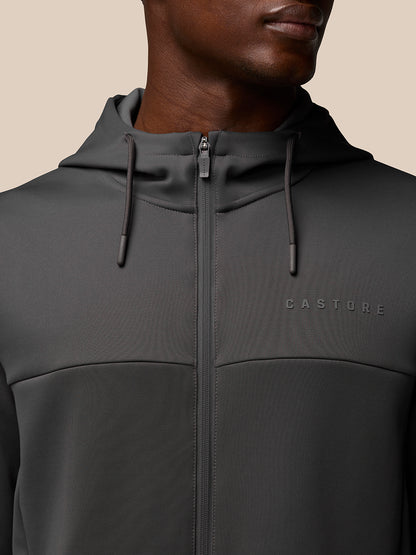 Close-up of charcoal Flex Lifestyle Full Zip jacket showing hood with drawcord and front zipper.