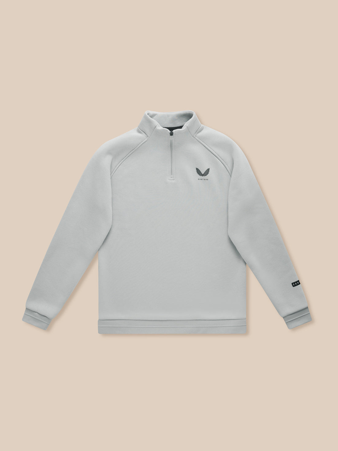 Close-up of light grey Adapt Fleece Quarter Zip top with stand collar and zip on a neutral backdrop