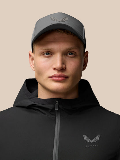Male model wearing black Flex Lifestyle Jacket with hood and left chest logo