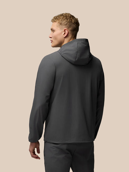 Charcoal Lightweight Flex Jacket worn by a male model shown from back with hood