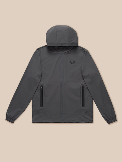 Front view of gunmetal Flex Classic Lifestyle Jacket laid flat with hood, full zip and zip pockets visible.