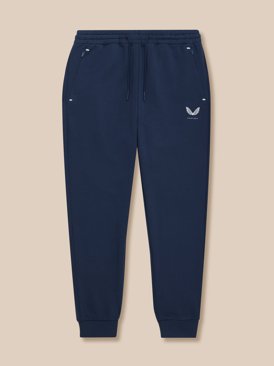 Navy Travel Lifestyle Joggers with elastic drawcord waistband, concealed zip pockets, cuffed hems and Castore branding.