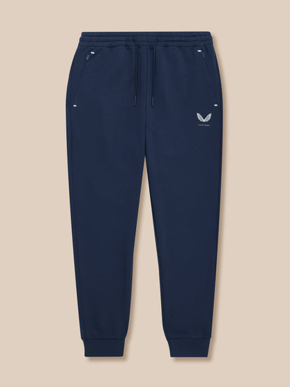 Navy Travel Lifestyle Joggers with elastic drawcord waistband, concealed zip pockets, cuffed hems and Castore branding.