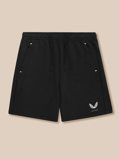 Black Travel Lifestyle Shorts with drawstring waist, concealed zip pockets, and Castore logo at lower right leg.