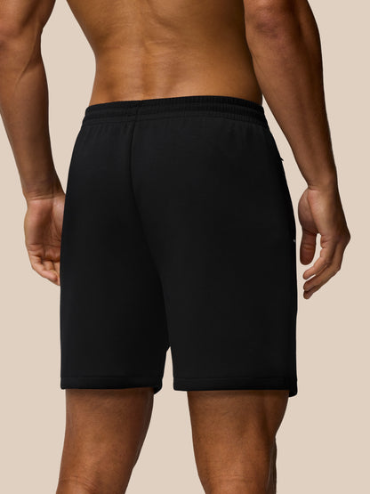 Back view of Travel Lifestyle Shorts in black with an elastic waistband
