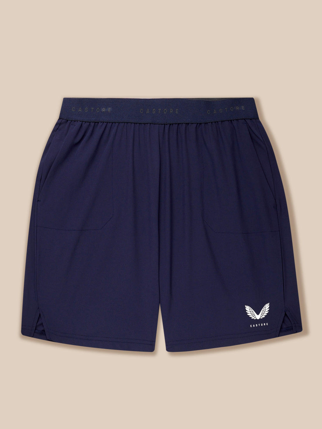 Back view of navy Adapt Training Shorts with elastic waistband and Castore logo on the lower right leg.