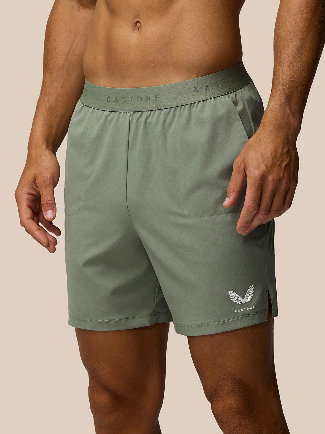 Adapt training shorts in Thyme Mint with jacquard waistband and zipped side pockets.