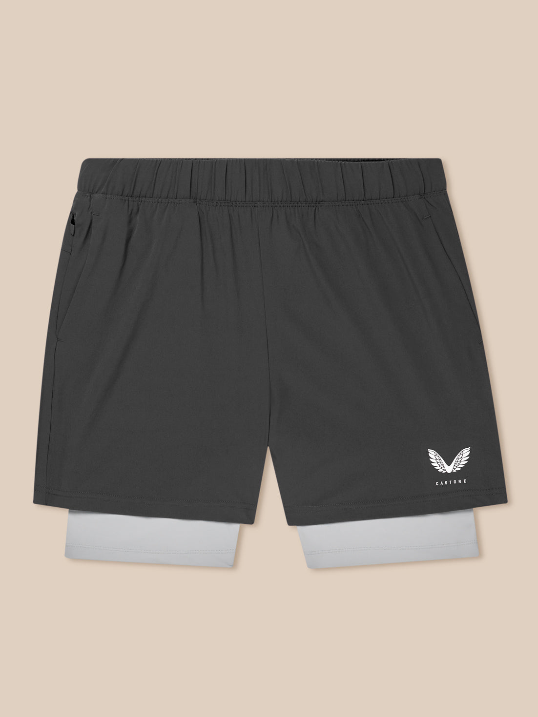 Flat lay of Flow Training 2-In-1 Short in dark grey with light grey inner layer and Castore logo on leg.