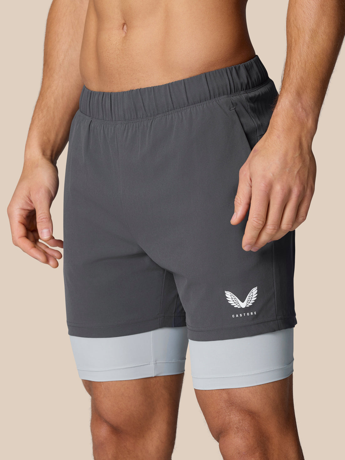 Mid grey Flow Training 2-in-1 shorts with inner liner, side pocket and Castore branding on the thigh