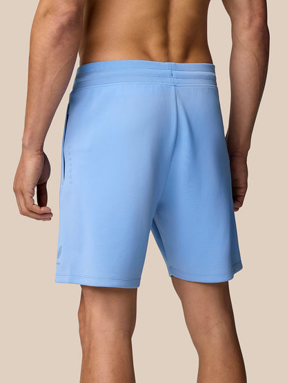 Back view of light blue Flex Shorts showing drawstring waistband and sleek athletic fit.