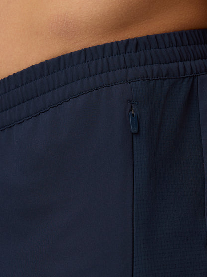 Close-up of midnight navy Apex Training Shorts fabric and elastic waistband with internal drawcord