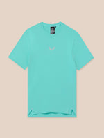 Model wearing Zone Training T-Shirt in light aqua, chest logo visible.