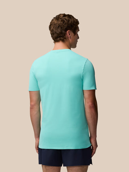 Back view of a man wearing Zone Training T-Shirt in Light Aqua with subtle back ribbing.