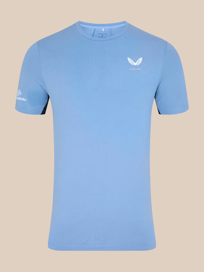 Close up showing the sky blue Apex Training T-Shirt chest area with textured fabric and Castore logo.
