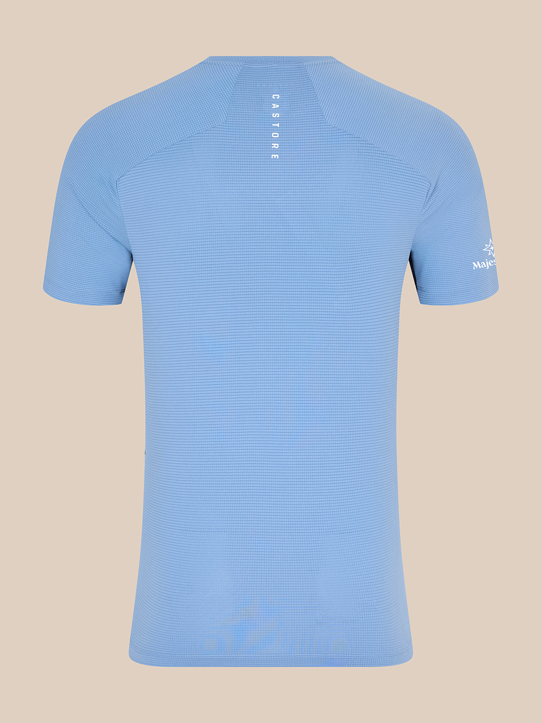 Back view of sky blue Majesticks T Shirt with vertical CASTORE branding on the upper back and sleeve emblem.