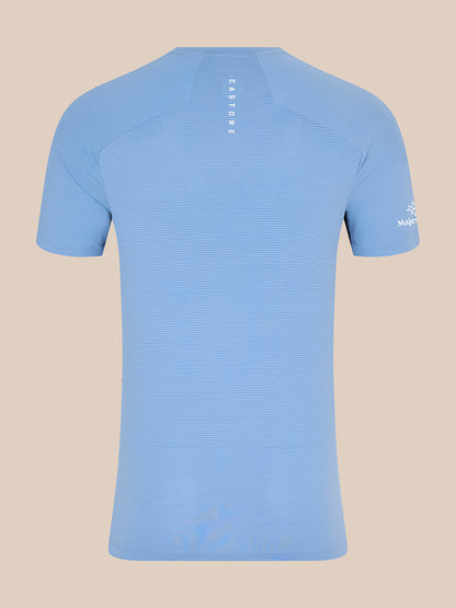 Back view of sky blue Majesticks T Shirt with vertical CASTORE branding on the upper back and sleeve emblem.