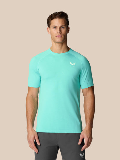 Flow Training T-Shirt in light aqua worn by a male model, front view