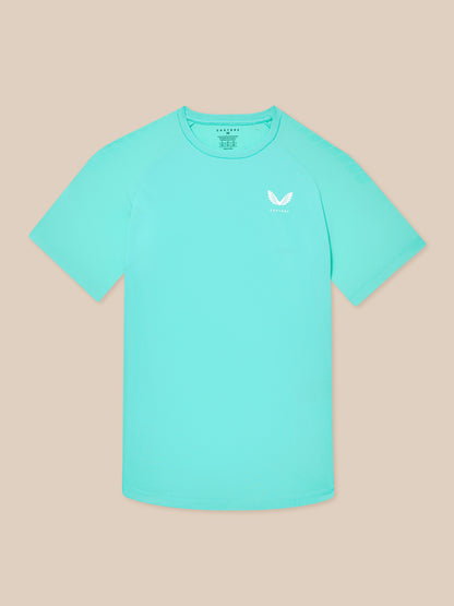 Male model wearing light aqua Flow Training Muscle Grip T-Shirt front view with chest logo.