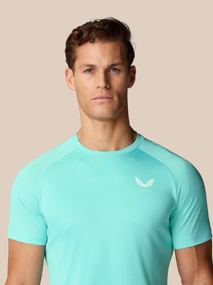 Male model wearing light aqua Flow Training Muscle Grip T Shirt head and shoulders portrait