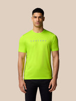 Front view of a man wearing Acid Lime Graphic Training T Shirt featuring a Castore logo on the chest